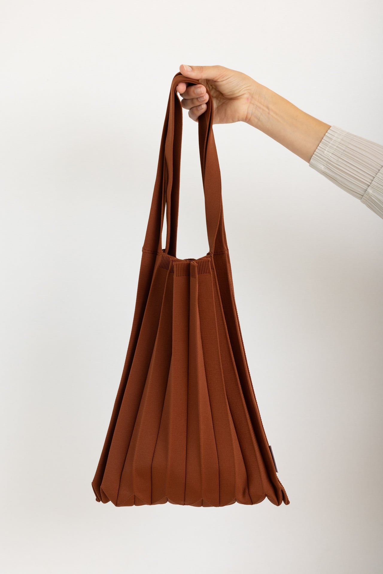 PLEATS MAMA – The Design